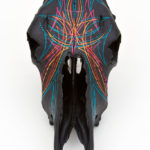 Cow skull with southwest striping